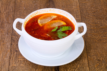Solyanka soup with lemon
