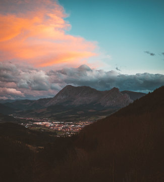 Colorful sky above mountain valley