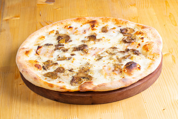Pizza with mushrooms and ham