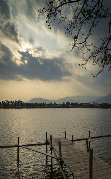 pier and river view at sunset in kampot town cambodia