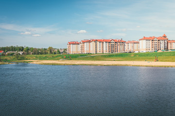 Residential buildings with balconies in the city, urban development of apartment houses. Ostrovets, Belarus