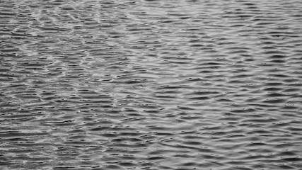 Texture of water in a river - monochrome