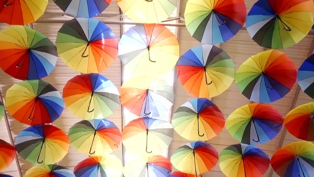 installation on the roof. colorful umbrellas.