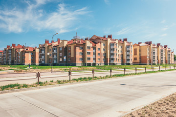 Residential buildings with balconies in the city, urban development of apartment houses. Ostrovets, Belarus