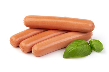 Fresh boiled sausages with basil, isolated on white background.
