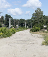 bad asphalt road, pit on the road