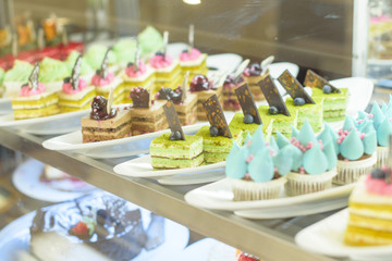 the cakes in the bakery window