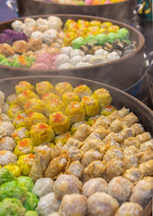 Various variations of dim sum in a steam basket.