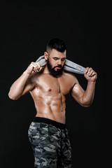 Fototapeta na wymiar strong bodybuilder with towel