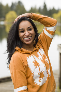 Portrait of Indian woman in workout clothing, outdoors