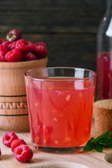 kissel of raspberry, Russian traditional drink, national cuisine, fresh berries, rural style, wooden background