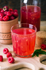 kissel of raspberry, Russian traditional drink, national cuisine, fresh berries, rural style, wooden background