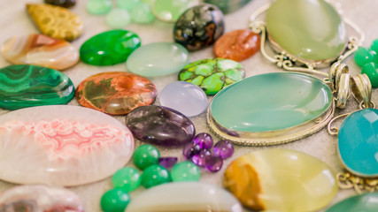 assorted colorful gemstone cabochon. geology and mineral background