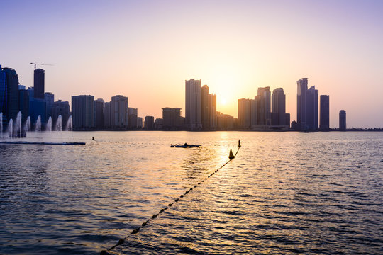 Panoramic view of Sharjah waterfront in UAE at sunset