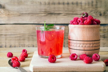 kissel of raspberry, Russian traditional drink, national cuisine, fresh berries, rural style, wooden background