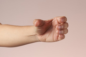 Hand holding bottle