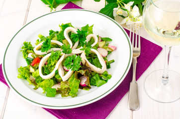 Fresh lettuce and squid rings