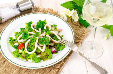 Fresh lettuce and squid rings
