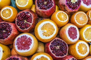 Pomegranates and oranges on street market Istanbul