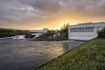 Sunset over Hydro electric powerplant - 208441754