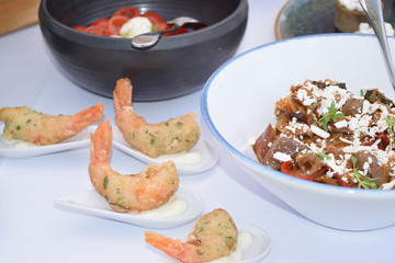 fingerfood of prawns breaded in single portions