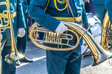 A military brass band-Man plays the trumpet