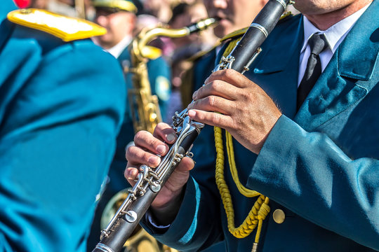 Military man playing the clarinet