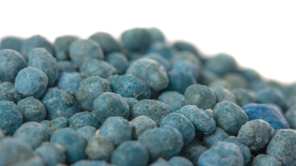 Heap of mineral fertilizers, isolated on the white background