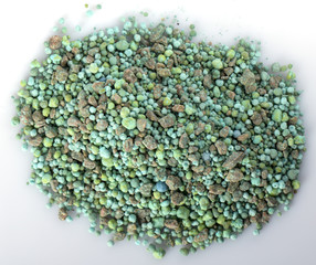 Heap of mineral fertilizers, isolated on the white background