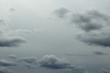 Gray sky and gray dark cumulus clouds. Landscape. Background.