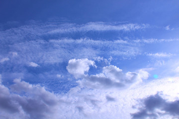 Beautiful blue sky and beautiful white cirrus and cumulus clouds. Landscape. Background.