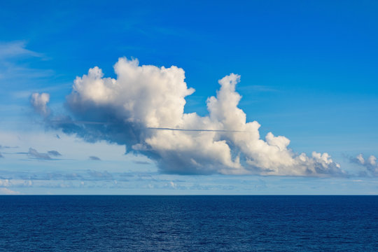 Dramatic sunset cloudscape at opem sea