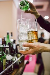 Waiters preparing cocktails