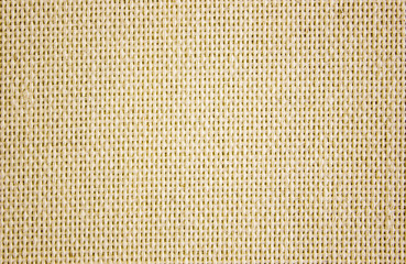 Rough canvas yellow canvas. Texture of coarse cloth, burlap