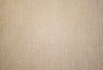 Rough canvas yellow canvas. Texture of coarse cloth, burlap