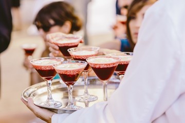 Drinks during a wedding in glass cups with ice