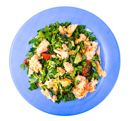 Salad and green leaves and fish