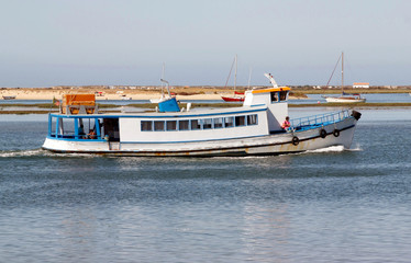 Fototapeta na wymiar Boats in Ria Formosa