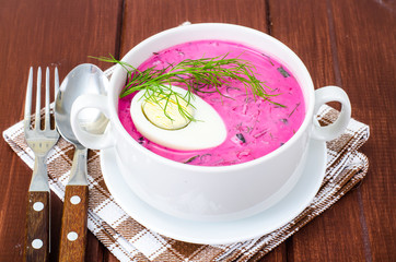 Cold beet soup with egg, fresh herbs, cucumber and herbs