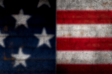 A blurred, grungy, American flag background. The stars and stripes