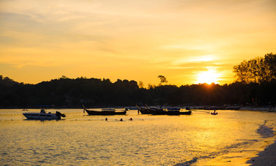 Sunset in the evening colorful beautiful beach.