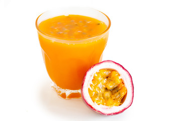 Passion fruit and passion fruit juice In a glass White isolated background 