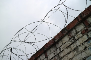 Barbed wire, barbed wire on the fence.