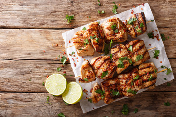 Kebab e Murgh - Chicken Kabab Marinated in a Yogurt Cumin Sauce closeup. horizontal top view from above