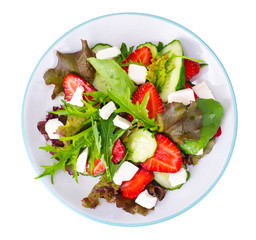 Summer vegetable salad with strawberries