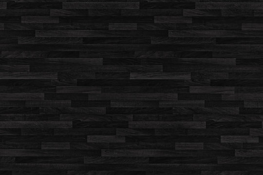 Black wood parquet texture. Background old panels.