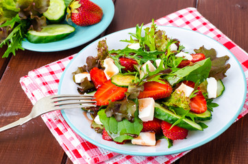 Summer vegetable salad with strawberries