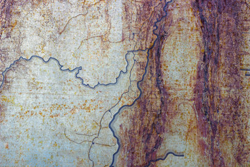 Metallic rusted painted surface as abstract background.
