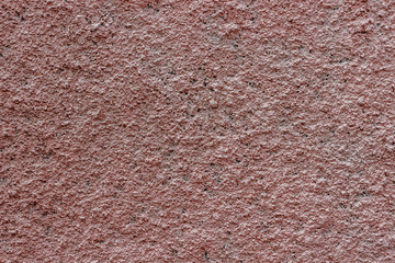 Concrete background with pink decorative plaster.