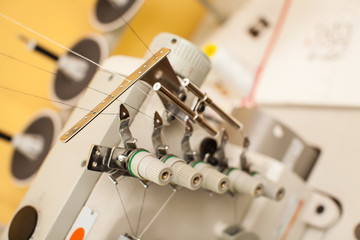 Thread Tangled Around Sewing Machine Take-up Arm. part of sewing machine, top view